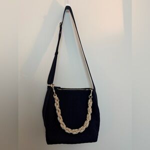 The Mini Zip Bucket in Navy with the Shoulder Strap